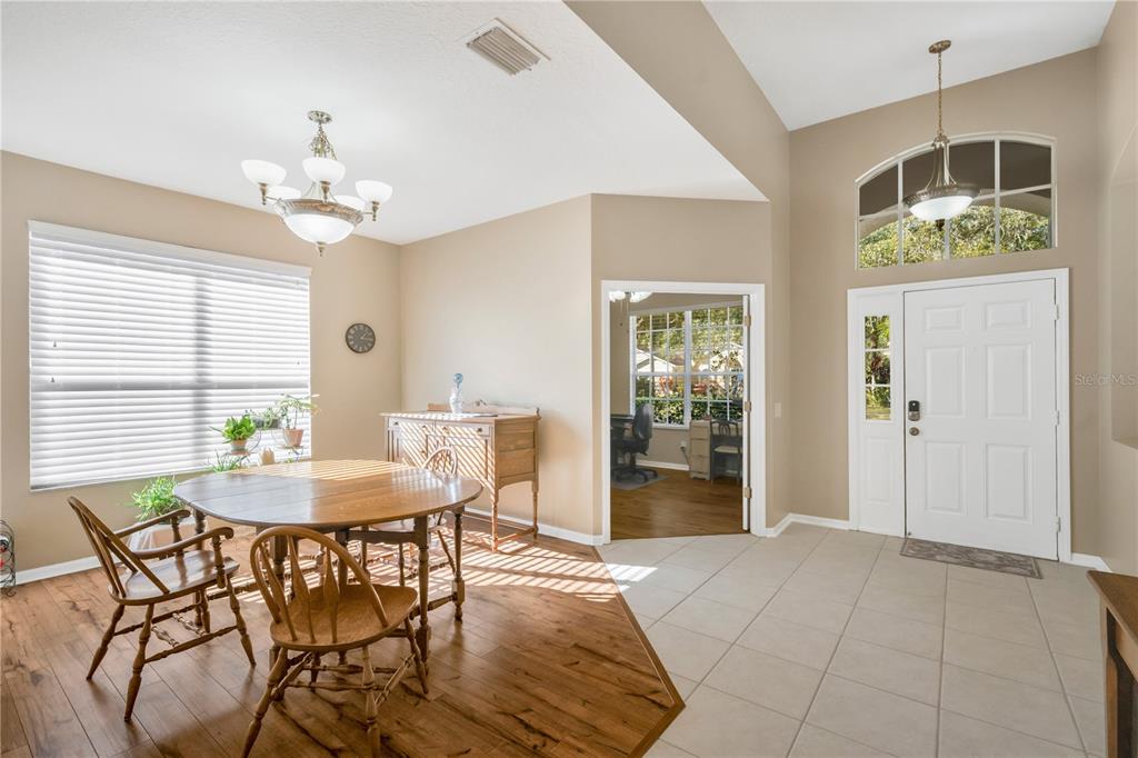 17115 Falconridge Road Lithia, FL 33547 - Photo 12 of 33 a dining room with furniture and window