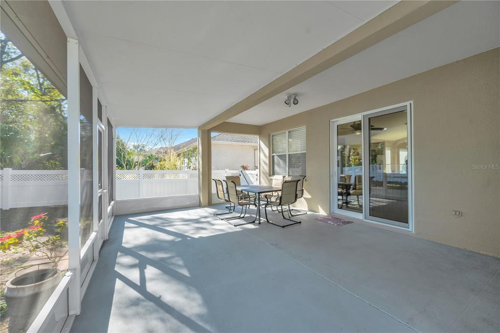 17115 Falconridge Road Lithia, FL 33547 - Photo 23 of 33 a view of a two room with furniture and floor to ceiling window