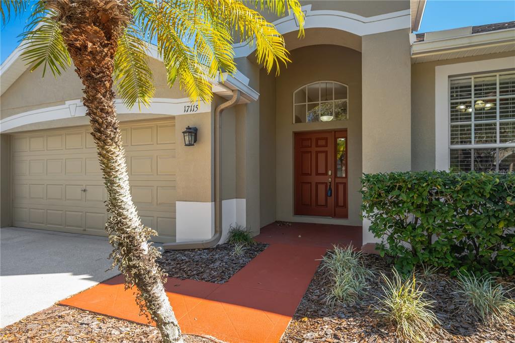17115 Falconridge Road Lithia, FL 33547 - Photo 32 of 33 a front view of a house with a yard