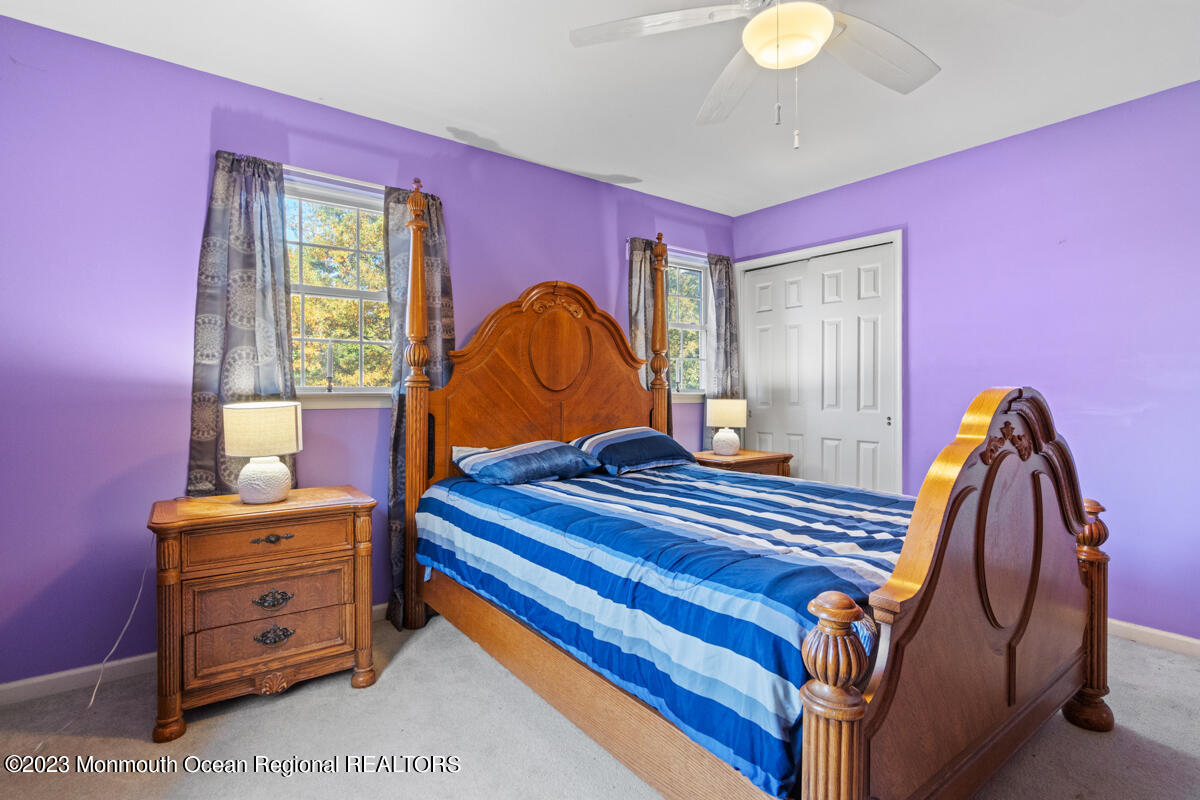 6 Forest View Drive Bayville, NJ 08721 - Photo 14 of 39 a living room with furniture and a window