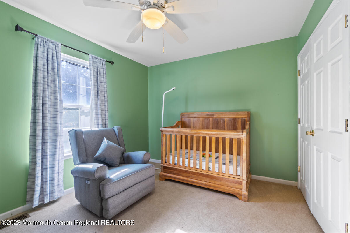 6 Forest View Drive Bayville, NJ 08721 - Photo 15 of 39 a bedroom with furniture and a window