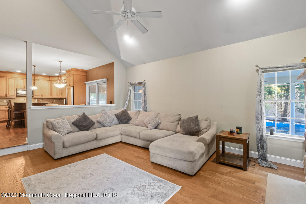 6 Forest View Drive Bayville, NJ 08721 - Photo 23 of 39 a living room with furniture and a large window
