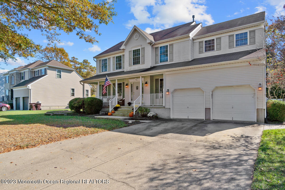 6 Forest View Drive Bayville, NJ 08721 - Photo 34 of 39 a view of a white house with a yard and large tree