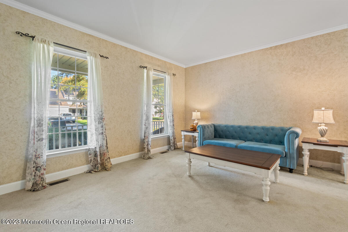 6 Forest View Drive Bayville, NJ 08721 - Photo 4 of 39 a living room with furniture and a window