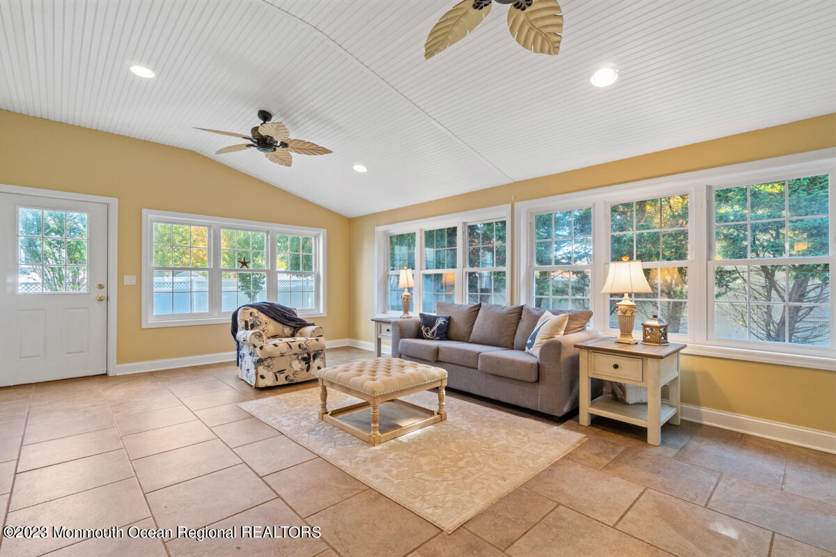 6 Forest View Drive Bayville, NJ 08721 - Photo 8 of 39 a living room with furniture and a large window