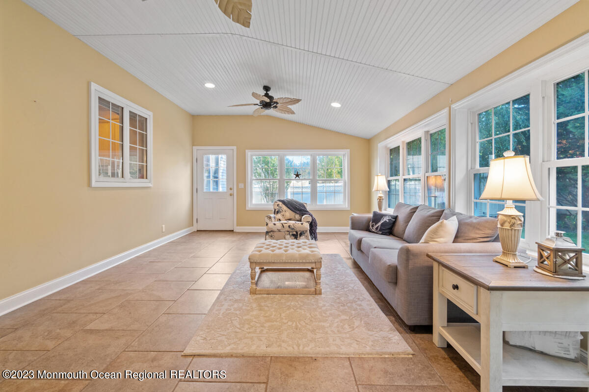 6 Forest View Drive Bayville, NJ 08721 - Photo 10 of 39 a living room with furniture and large windows
