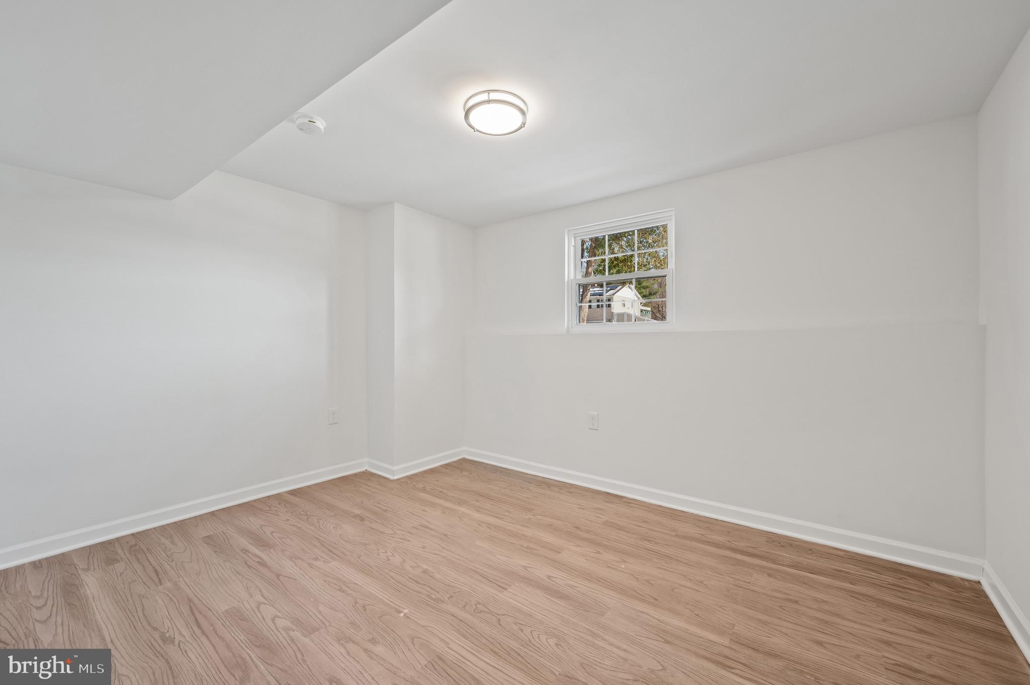 200 Timber Grove Road Reisterstown, MD 21136 - Photo 20 of 30 wooden floor in an empty room