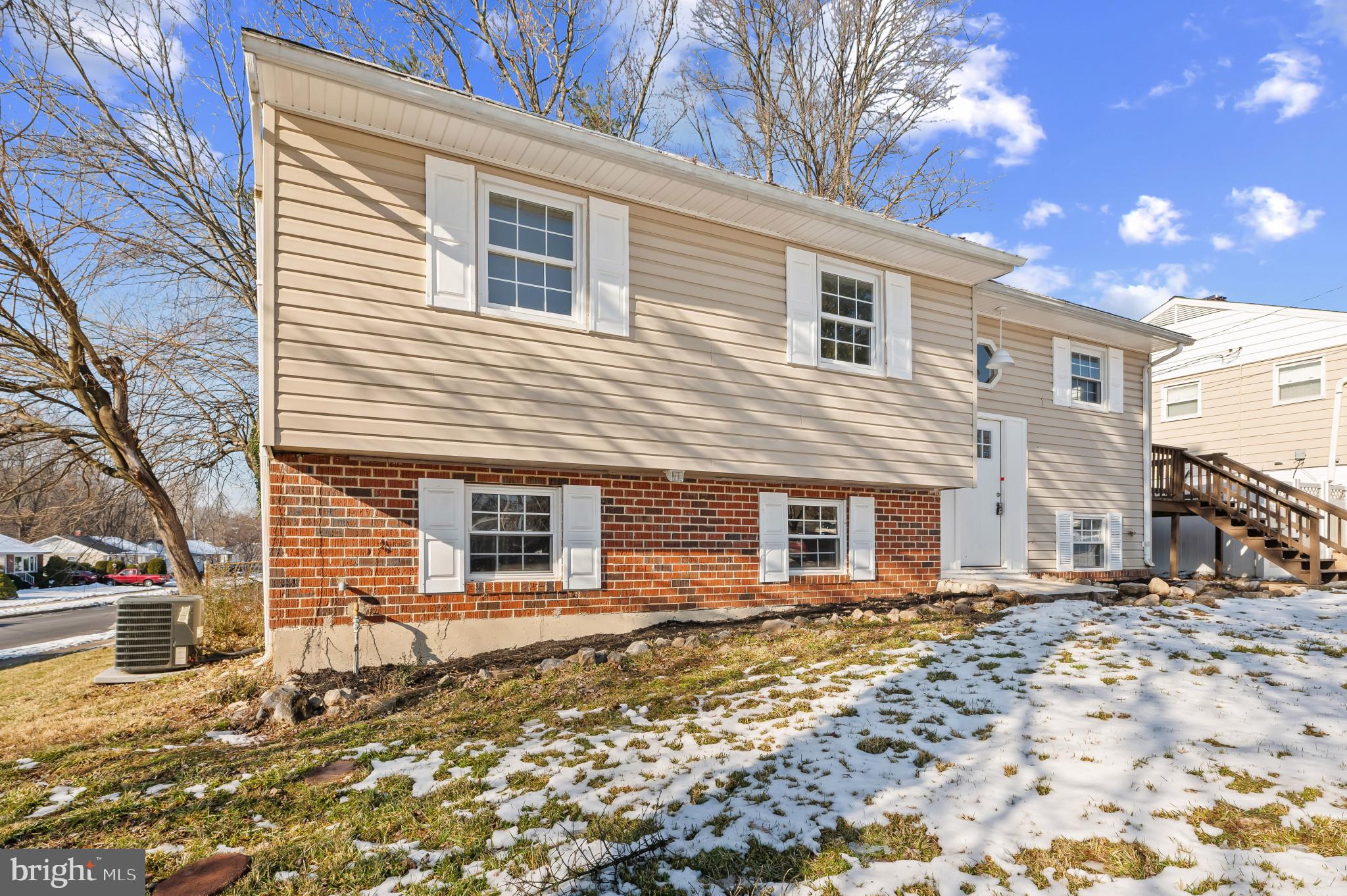 200 Timber Grove Road Reisterstown, MD 21136 - Photo 26 of 30 a front view of a house with a yard