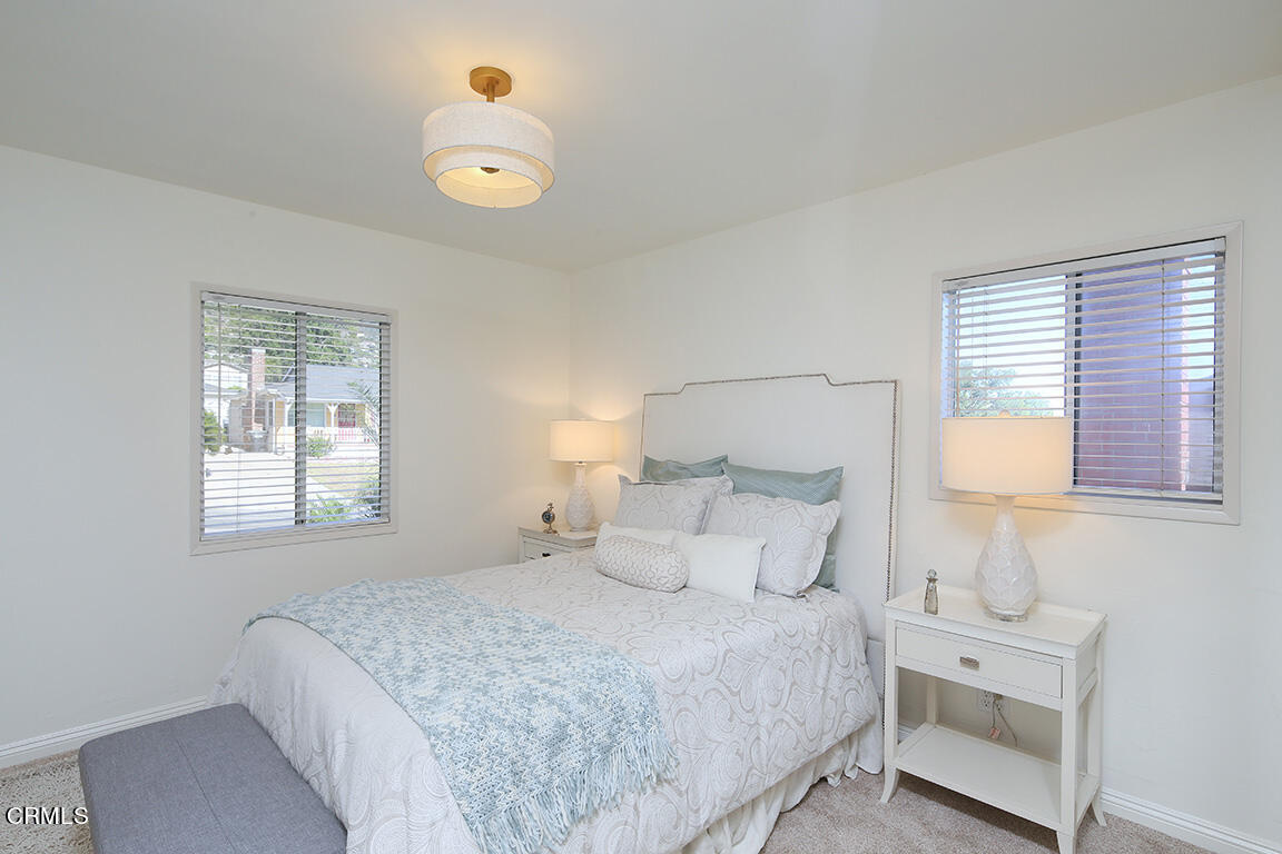 3330 Paraiso Way Glendale, CA 91214 - Photo 22 of 32 a bedroom with a bed and a window