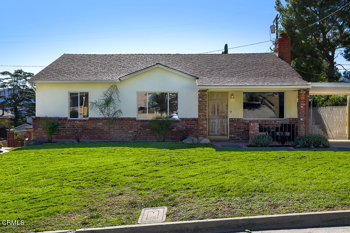 3330 Paraiso Way Glendale, CA 91214 - Photo 31 of 32 a view of a house with a yard