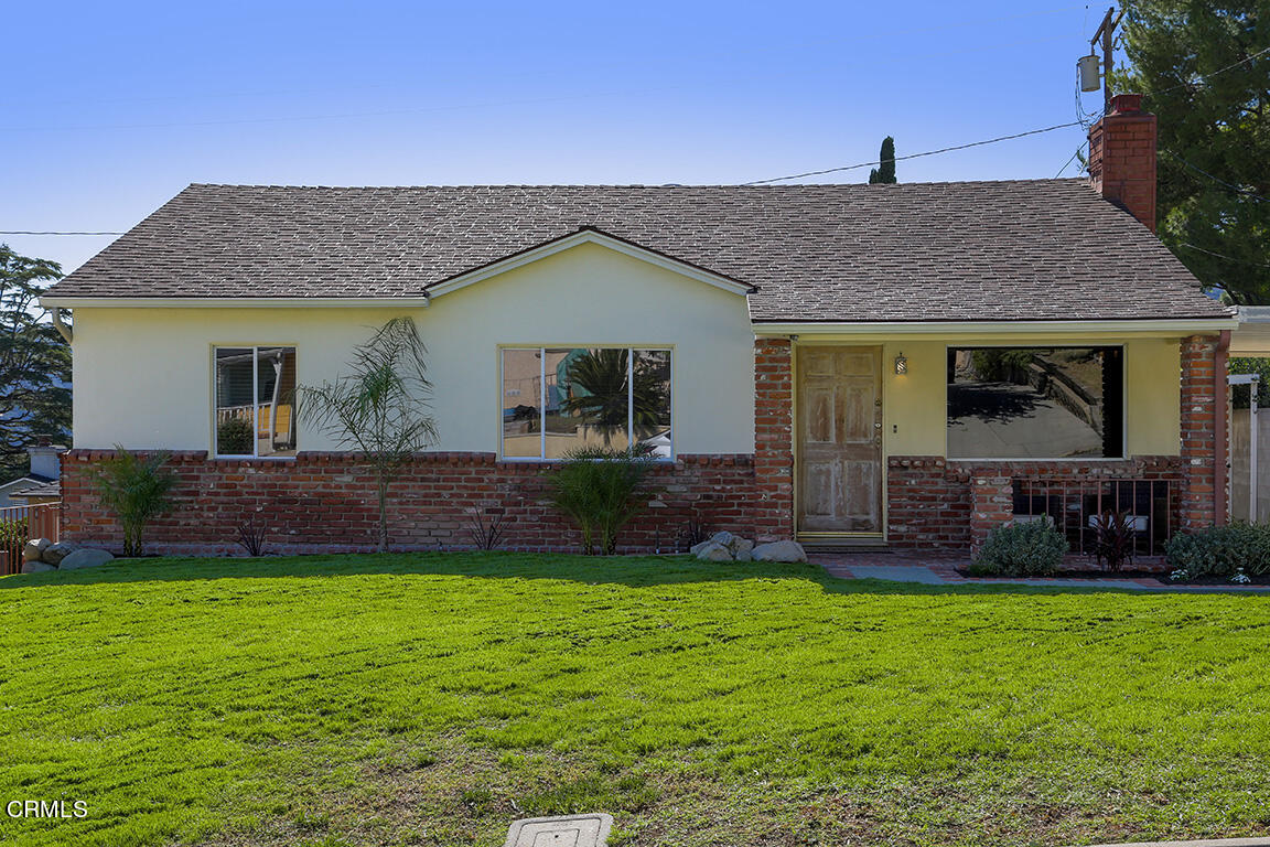 3330 Paraiso Way Glendale, CA 91214 - Photo 32 of 32 a front view of house with yard and outdoor seating