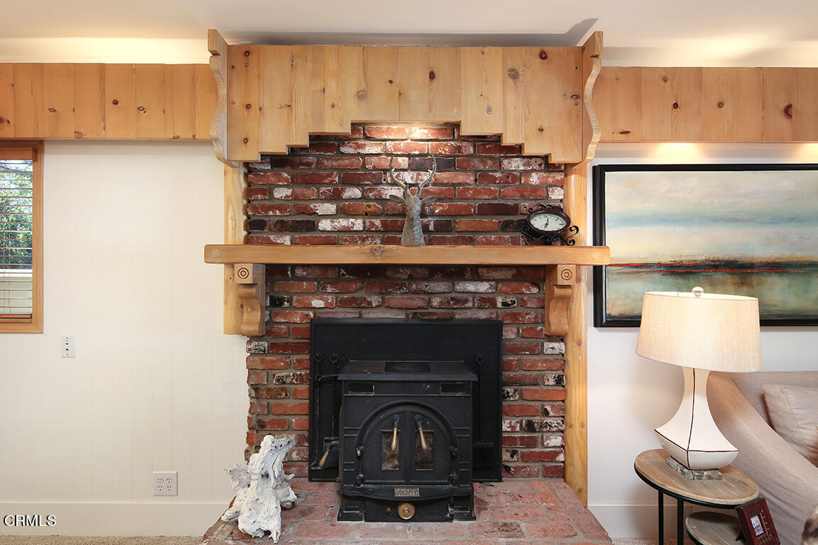 3330 Paraiso Way Glendale, CA 91214 - Photo 6 of 32 a kitchen with a stove and a fireplace