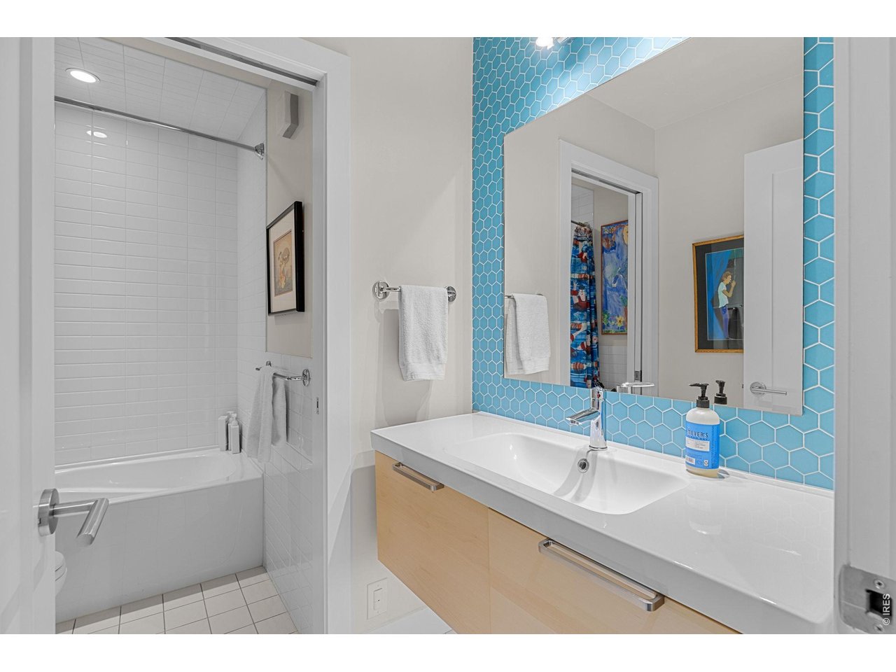 3123 3rd Street Boulder, CO 80304 - Photo 39 of 50 a bathroom with a sink and a mirror
