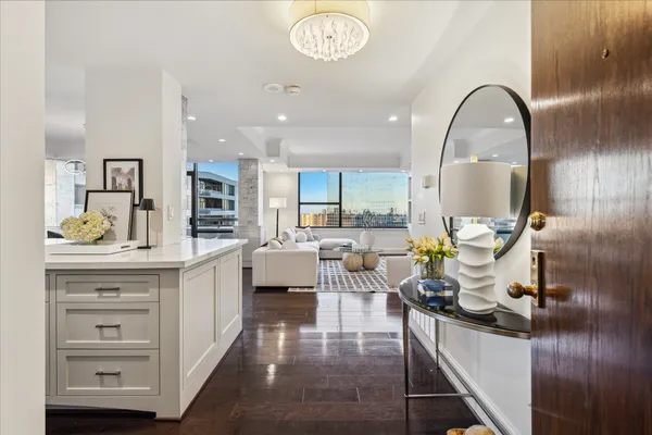 a kitchen with a table and chairs
