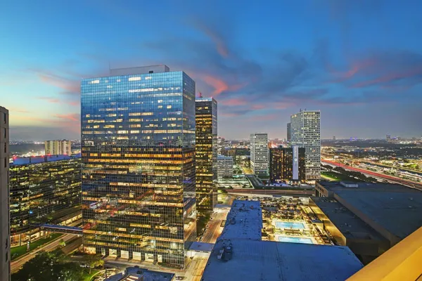 a close up view of a microwave and a stove