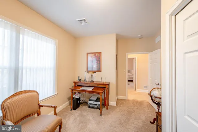 a room with furniture and a window