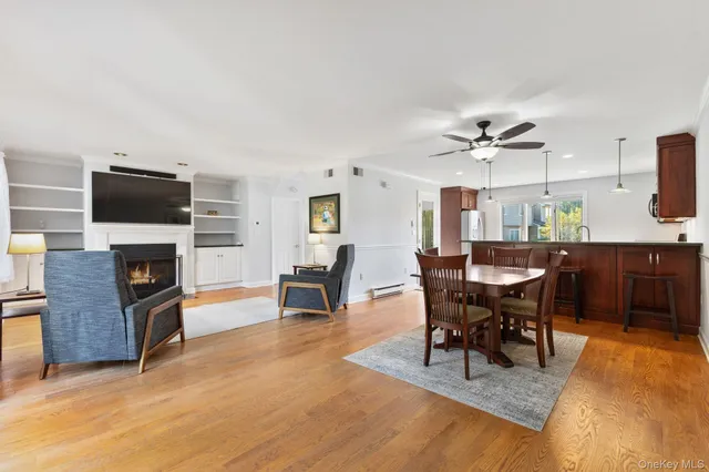 a view of a livingroom with furniture and a fireplace