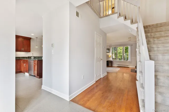 a view of a kitchen from the hallway
