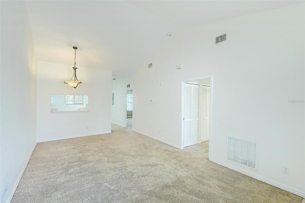 8358 Bernwood Cove Loop, Unit 708 Fort Myers, FL 33966 - Photo 13 of 32 a view of an empty room