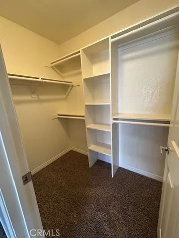 en view of an empty room with a window