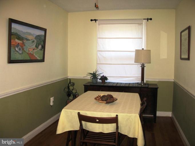 1058 Elm Road Arbutus, MD 21227 - Photo 9 of 17 Softly painted walls with chair rail and H/W fls.
