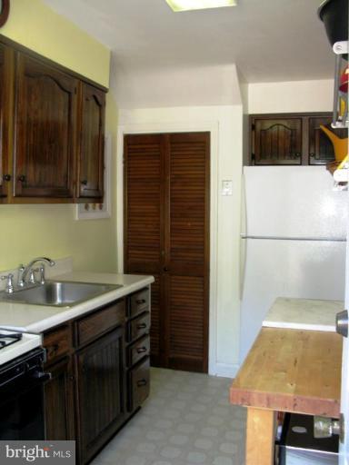 1058 Elm Road Arbutus, MD 21227 - Photo 10 of 17 Recently refinished cabinets w/access to L/L