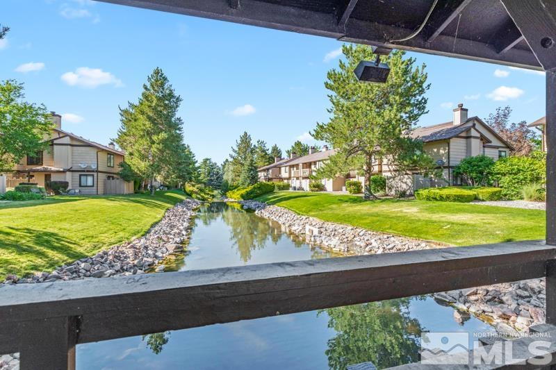 4853 Reggie Road Reno, NV 89502 - Photo 13 of 27 a view of a swimming pool with a yard