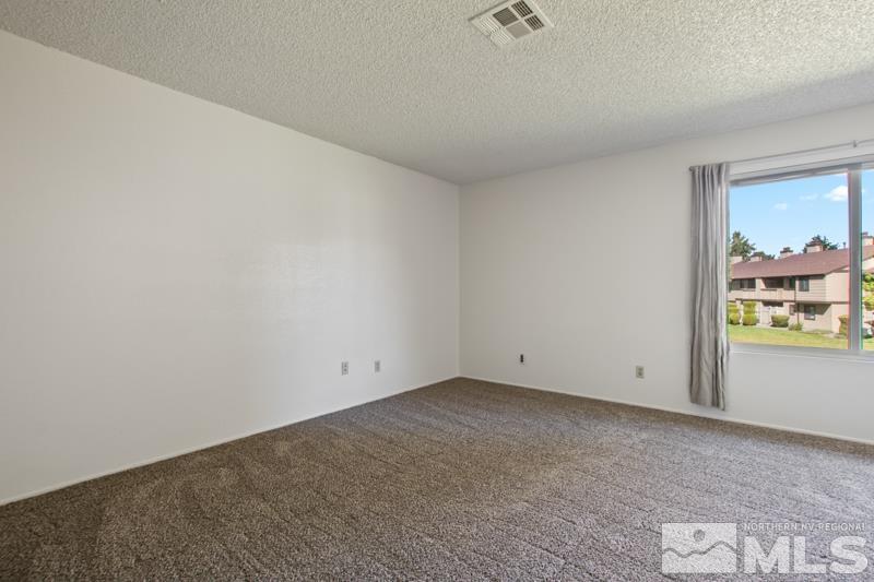 4853 Reggie Road Reno, NV 89502 - Photo 7 of 27 a view of room with window
