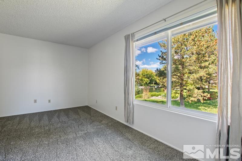 4853 Reggie Road Reno, NV 89502 - Photo 9 of 27 a view of room with window