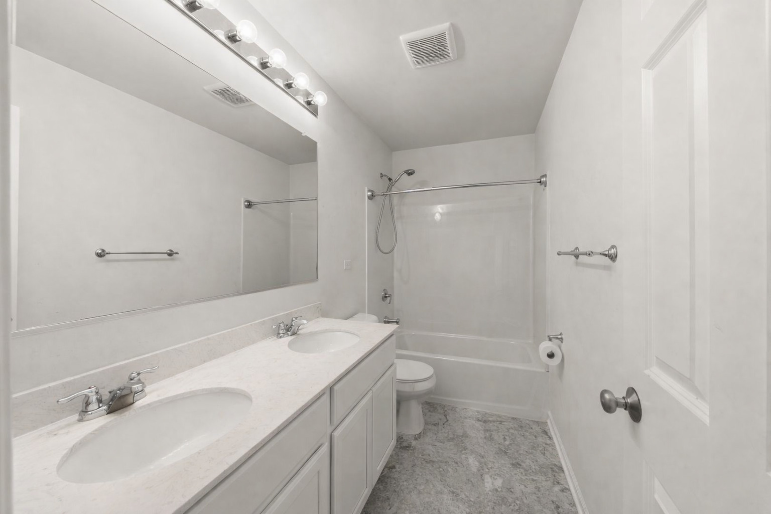 114 Schmidt Court Plano, IL 60545 - Photo 13 of 18 a bathroom with a double vanity sink toilet mirror and shower