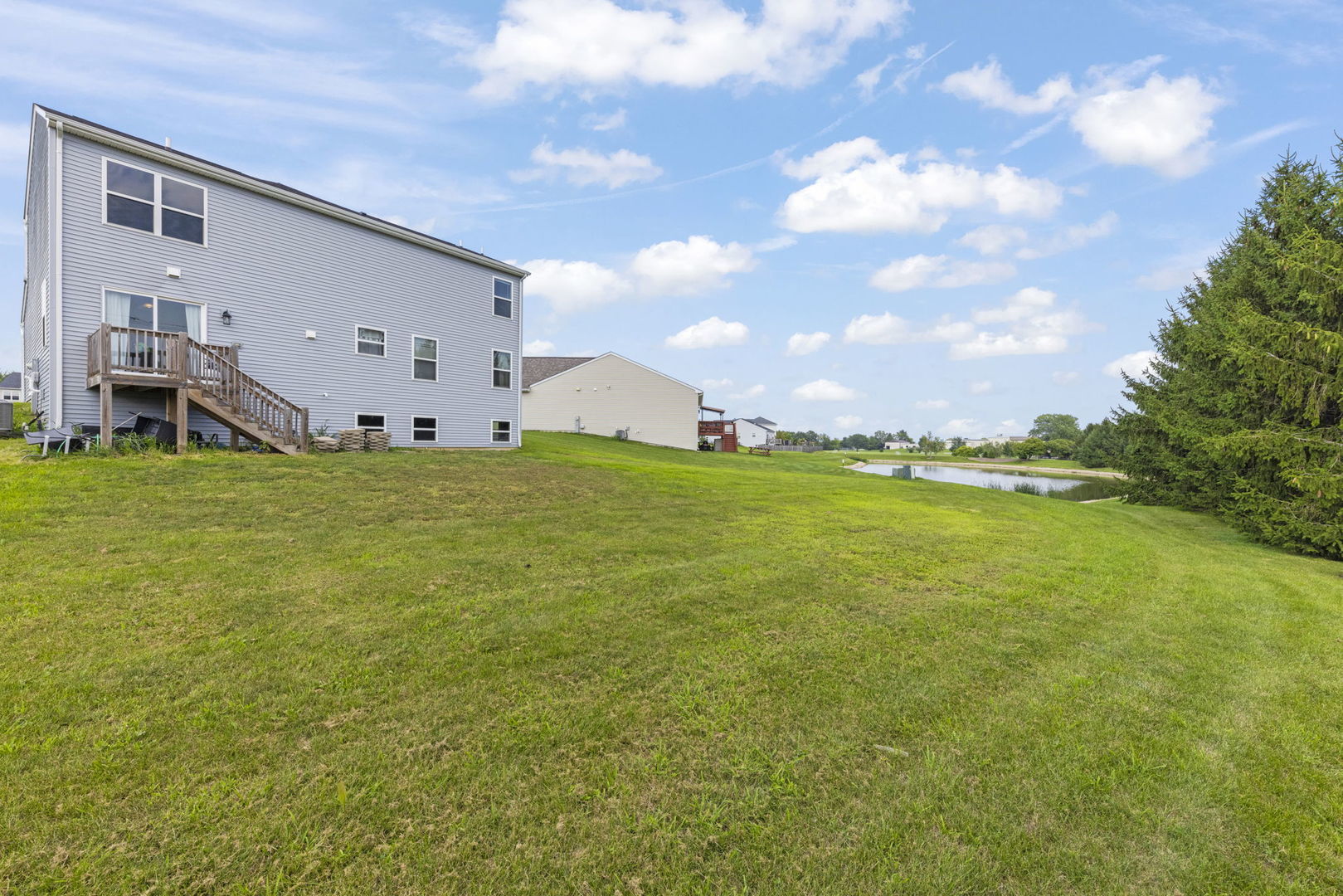 114 Schmidt Court Plano, IL 60545 - Photo 14 of 18 a view of a large pool with an outdoor space