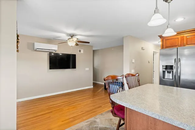 a very nice looking dining room with a table and chairs
