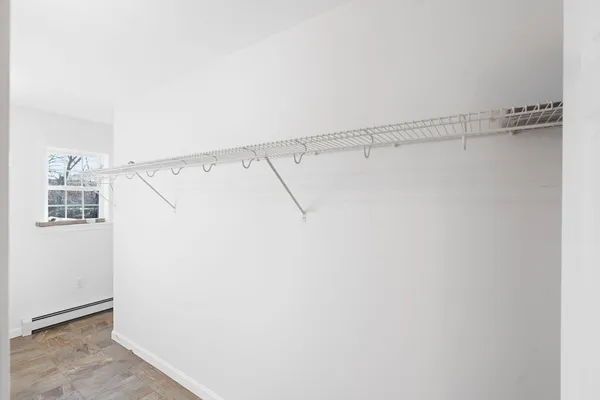 a view of a room with racks on the wall