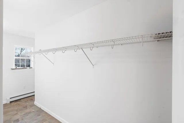 a view of a room with racks on the wall