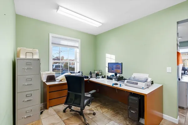 a room with furniture and a window