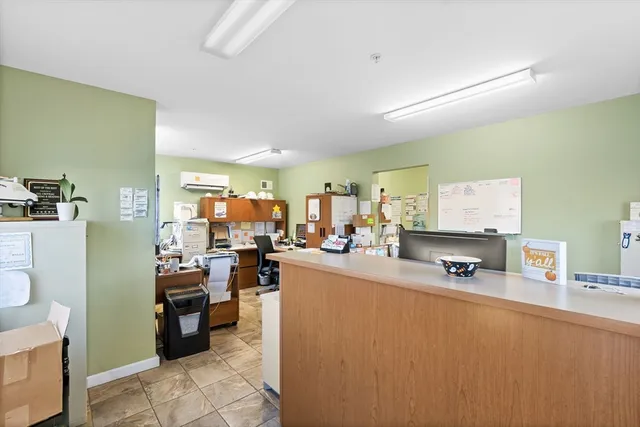 a room with furniture and a flat screen tv