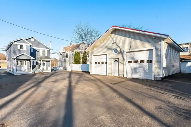 a view of a house with a street