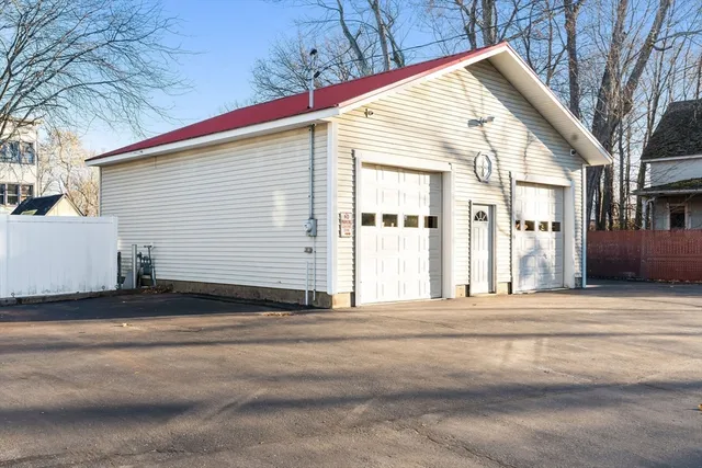 a view of a house with a street