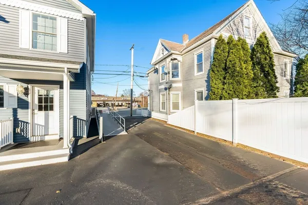 a view of a house with a street