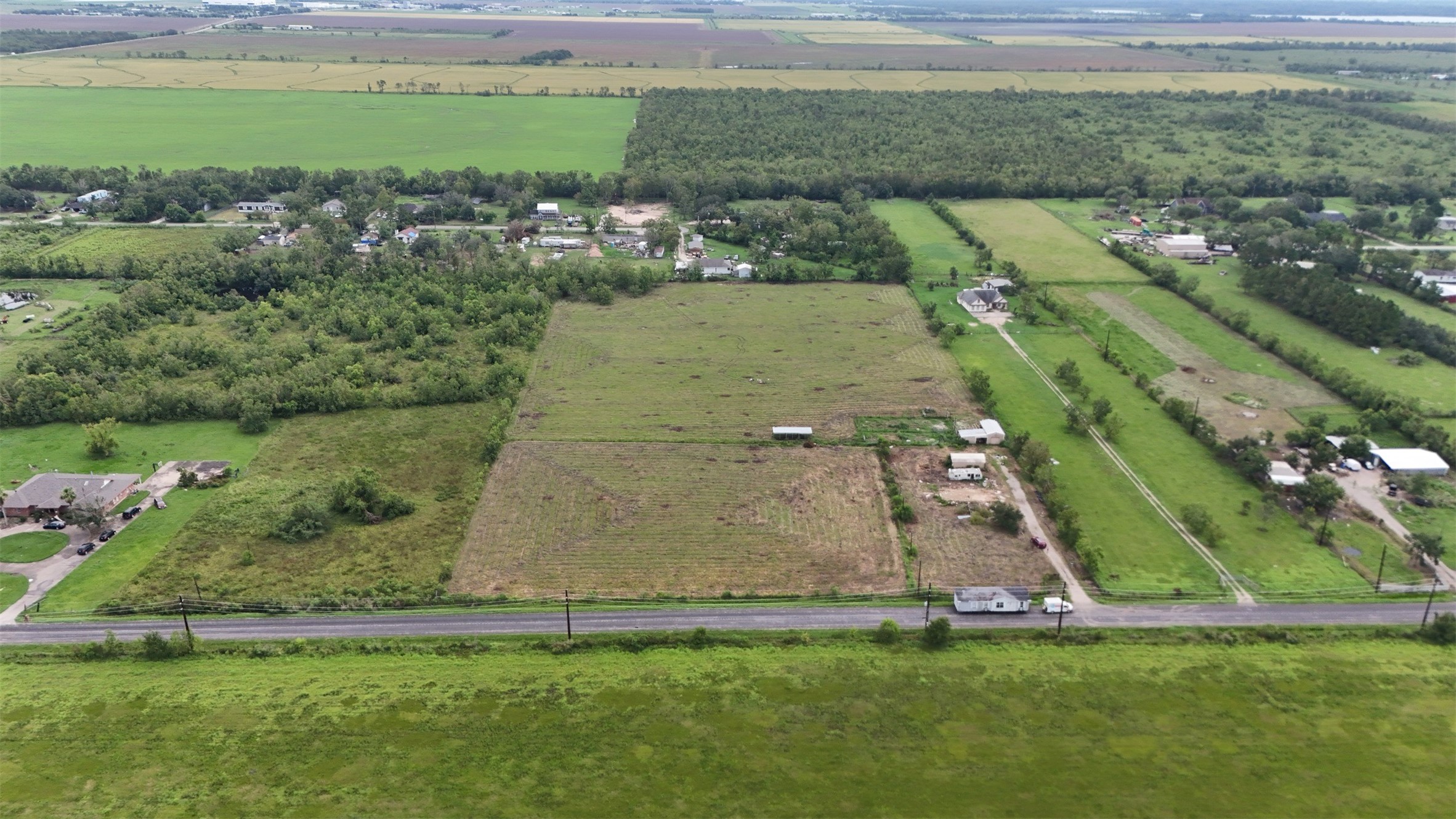 1602 County Road 62 Rosharon, TX 77583 - Photo 9 of 11 an aerial view of a house with a yard