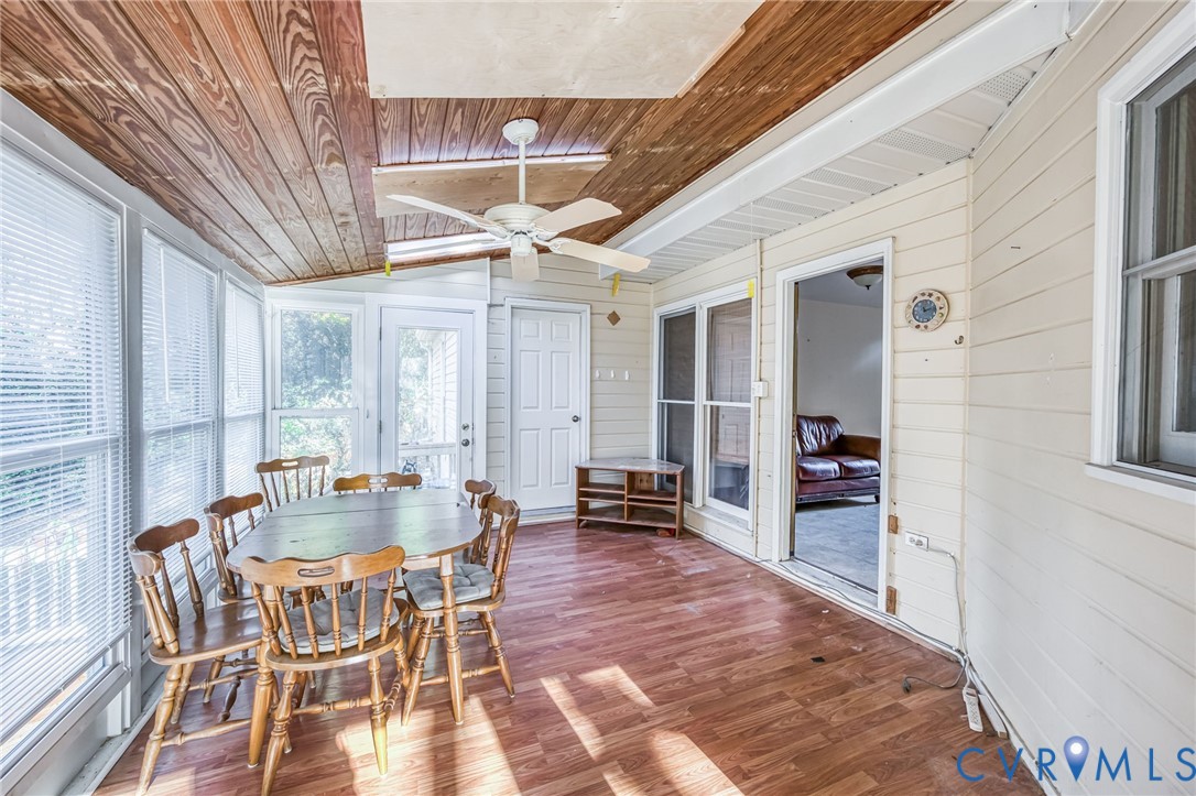 8902 Duchess Way Chesterfield, VA 23832 - Photo 16 of 34 a dining room with furniture and wooden floor