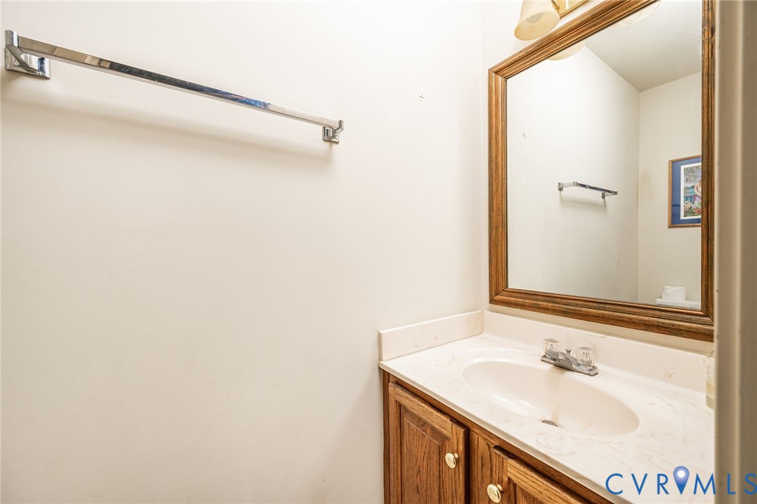 8902 Duchess Way Chesterfield, VA 23832 - Photo 21 of 34 a bathroom with a sink and a mirror