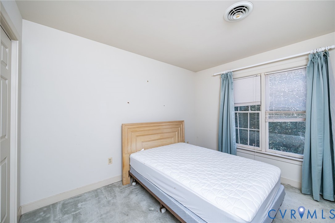 8902 Duchess Way Chesterfield, VA 23832 - Photo 22 of 34 a bedroom with a bed and window
