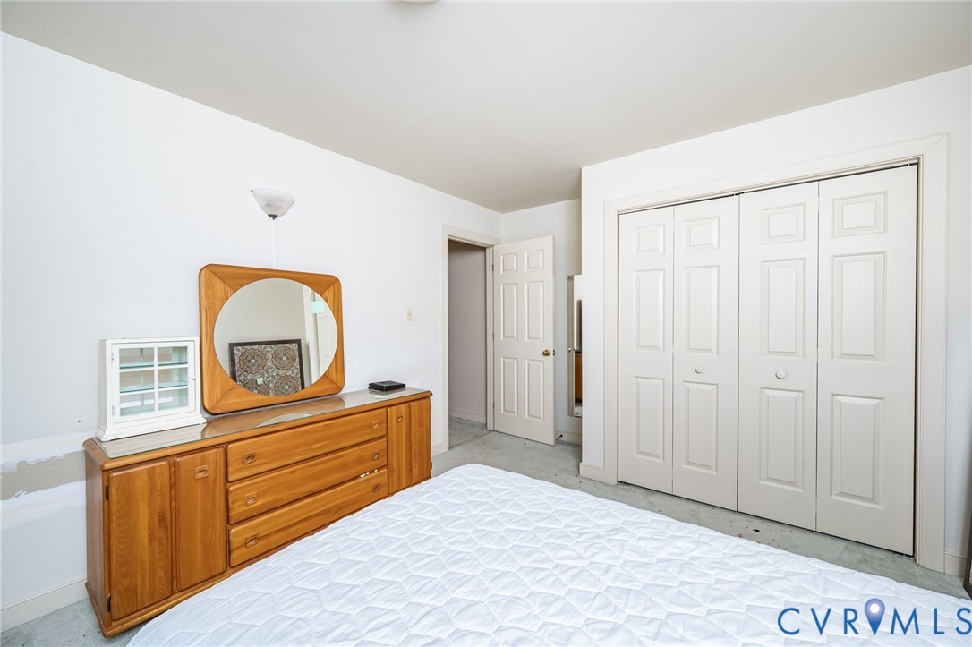 8902 Duchess Way Chesterfield, VA 23832 - Photo 23 of 34 a bedroom with a bed and a dresser