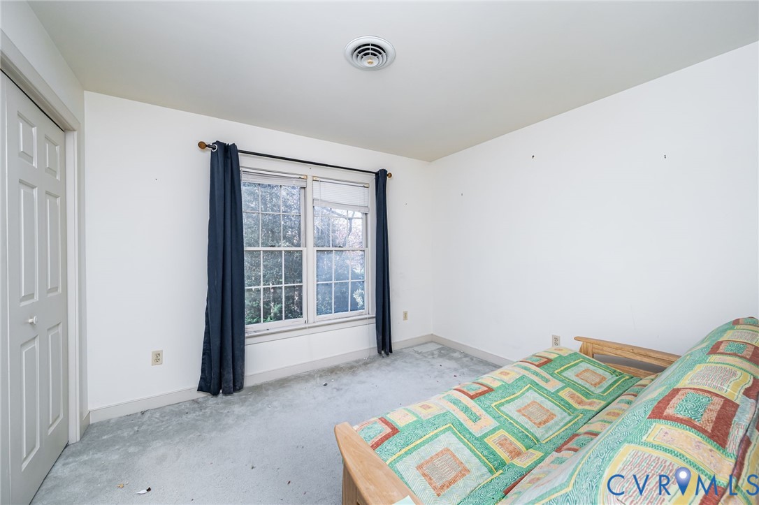 8902 Duchess Way Chesterfield, VA 23832 - Photo 24 of 34 a bedroom with a bed and a window