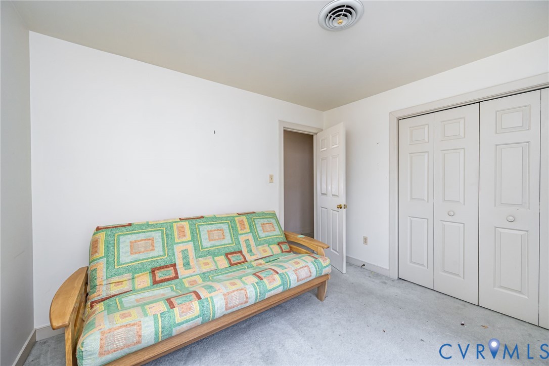 8902 Duchess Way Chesterfield, VA 23832 - Photo 25 of 34 a bedroom with a bed and a baby crib