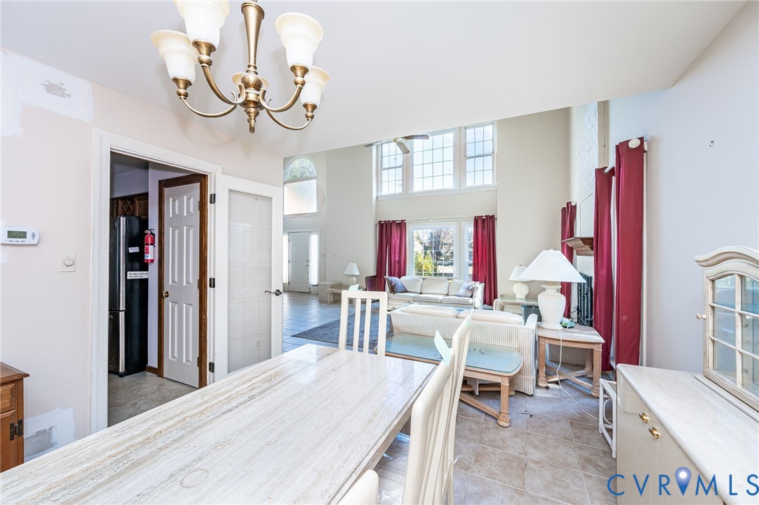 8902 Duchess Way Chesterfield, VA 23832 - Photo 10 of 34 a view of a dining room with furniture window and wooden floor