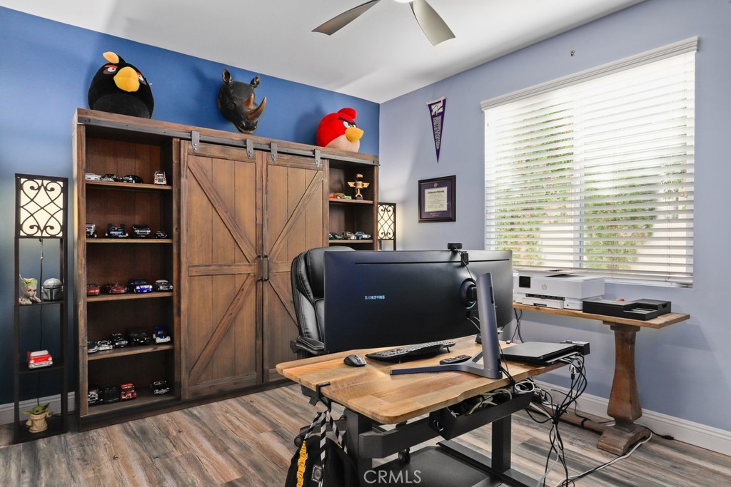 31319 Locust Court Temecula, CA 92592 - Photo 21 of 75 a view of a workspace with furniture and a window