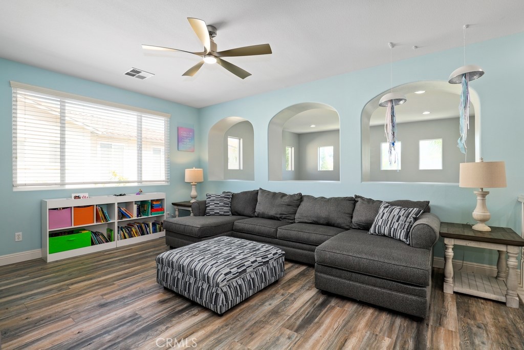 31319 Locust Court Temecula, CA 92592 - Photo 29 of 75 a living room with furniture and wooden floor