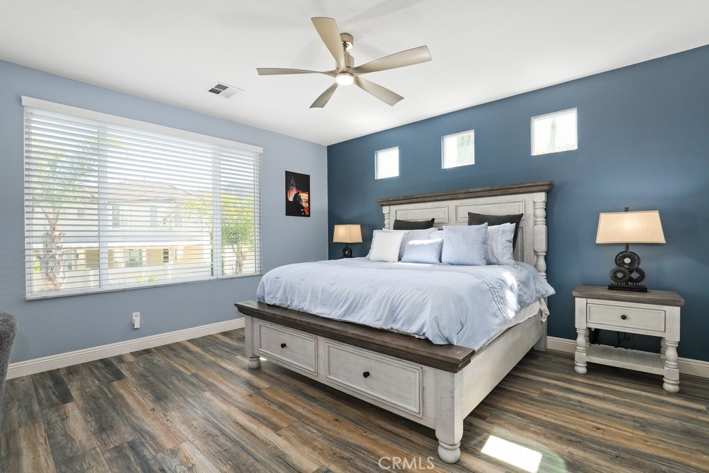 31319 Locust Court Temecula, CA 92592 - Photo 30 of 75 a bedroom with a large bed and a window